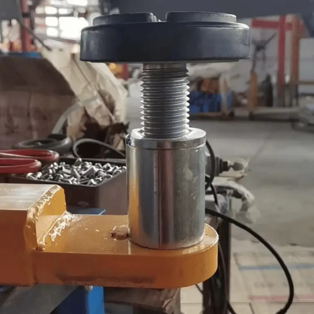 Katool KT-MP2 Lift Height Extensions (Set of 4) shown up close in a mechanic shop