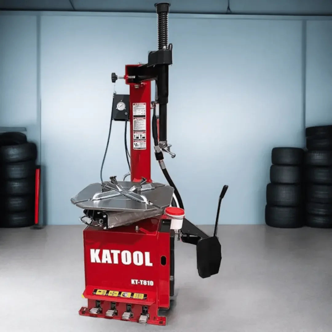 Katool KT-T810 Wheel Clamp Tire Changer Machine show with a tire shop background - Mechanic Superstore
