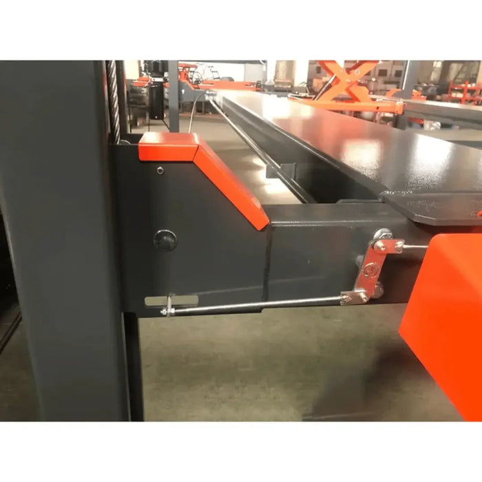 Katool KT-4H110 11,000lb 4 Post Car Lift up-close image of the platform and post joint in a mechanic shop - Mechanic Super Store