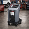 Robinair 34788NI R-134a Refrigerant Recovery Recycling and Recharge Machine shown inside a mechanic shop
