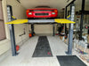 BendPak HD-9 9,000 lb. Super Wide Runway 4 Post Storage Lift in a residential garage- Mechanic Super Store