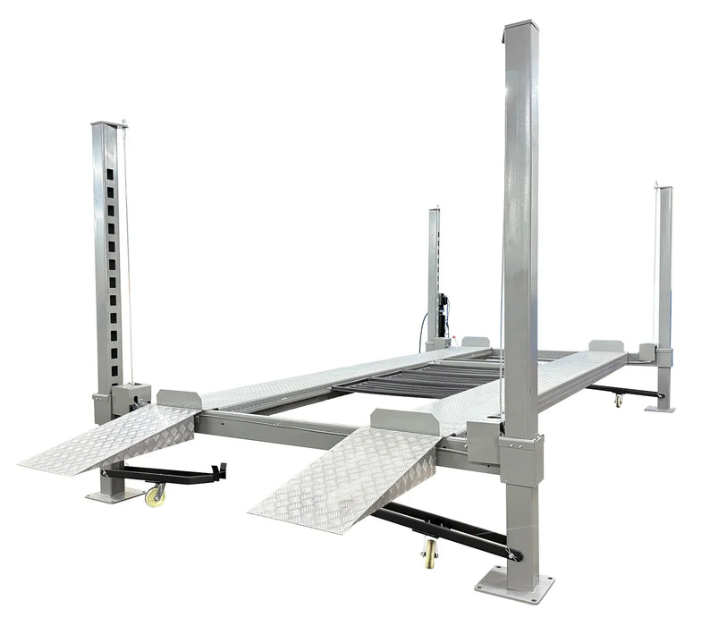 Triumph NOS10000 10,000 lb Service Storage 4 Post Automotive Lift shown lifted mid-level with ramps extended on a white background product page - Mechanic Super Store Car Lift