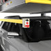 Bendpak 2 Post Lift PL-6000DCX 6,000 lb showing with two cars loaded and and up-close image of the emergency shut off switch.