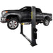 Supreme SP-10FP 10,000 lb Floor Plate 2 Post Car Lift set on a white background. lifted to mid height with a black pickup truck and the supreme car lift logo showing on the front post.