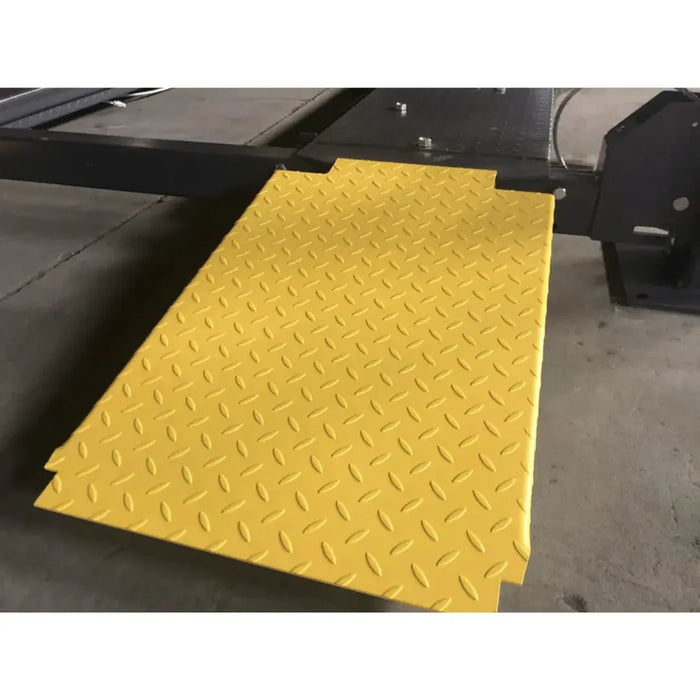 Supreme SP-85P 8,500 lb 4 Post Parking Lift loading ramp shown fully extended in the lowest position.